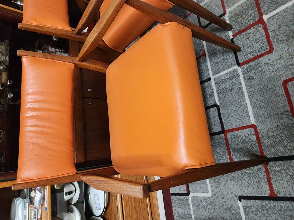 Teak arm chair - new foam and orange leather