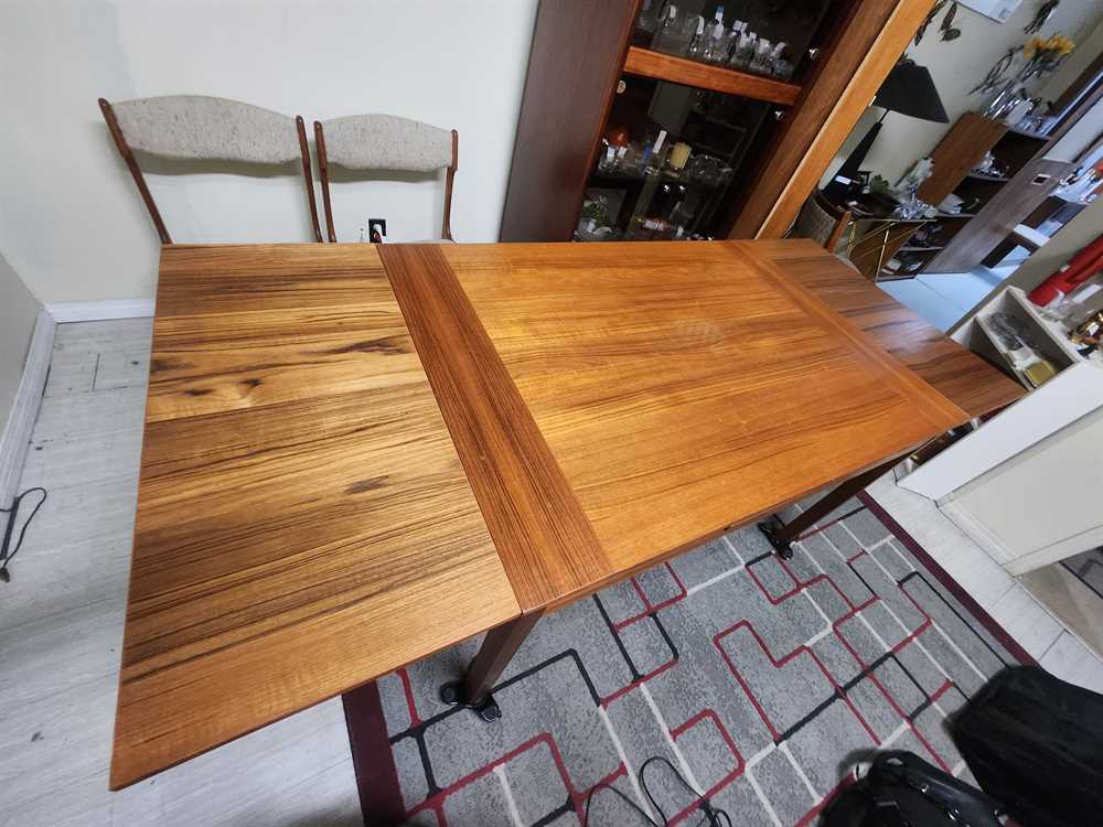 RS Associates Teak Draw Leaf Dining Table