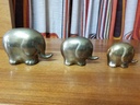 Set of three small brass Elephants