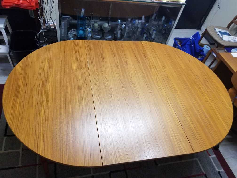 Nordsjo Nordstrom & Sjogren AB, Malmo Sweden Round - Oval Teak Dining Table w/ 1 leaf