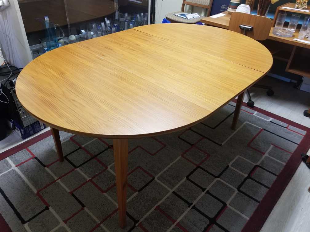 Nordsjo Nordstrom & Sjogren AB, Malmo Sweden Round - Oval Teak Dining Table w/ 1 leaf