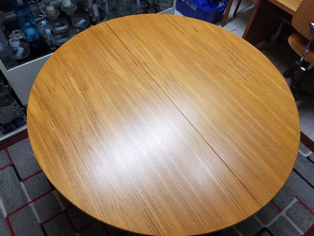 Nordsjo Nordstrom & Sjogren AB, Malmo Sweden Round - Oval Teak Dining Table w/ 1 leaf