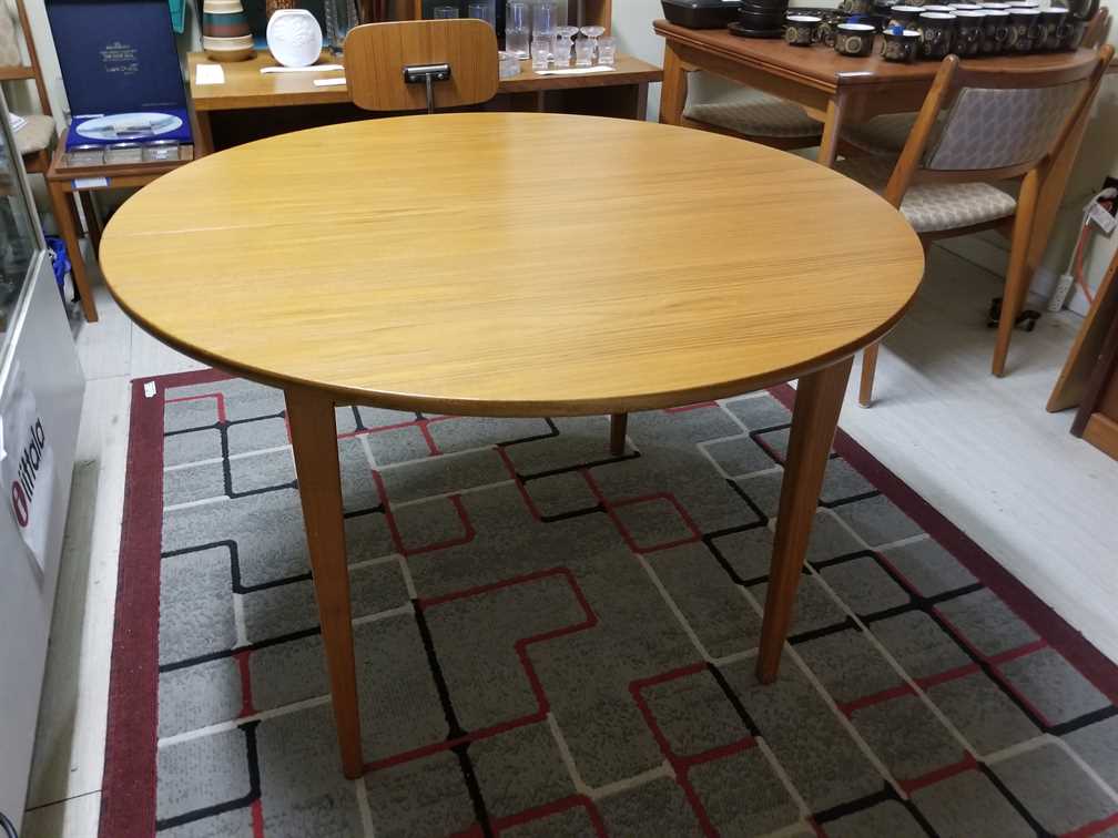 Nordsjo Nordstrom & Sjogren AB, Malmo Sweden Round - Oval Teak Dining Table w/ 1 leaf
