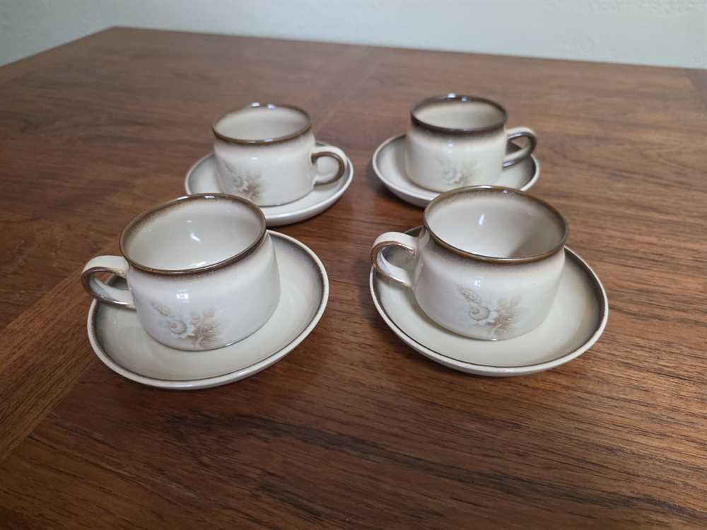 Set of four Denby Memories Teapcups and Saucers