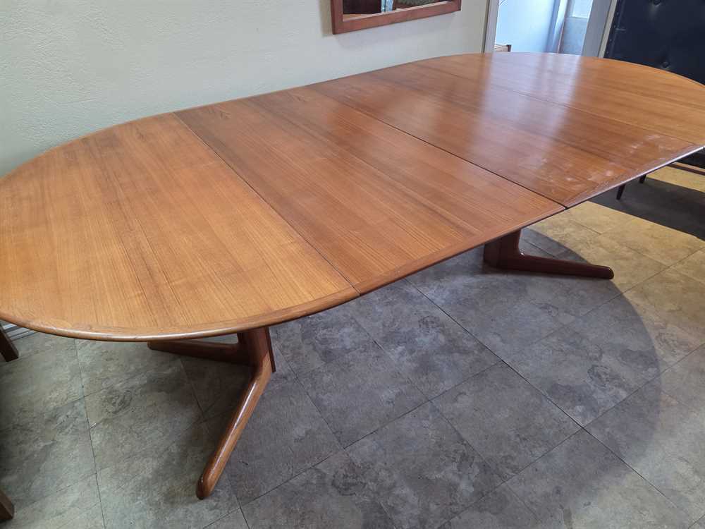 Danish Teak Round to Oval Dining Table w/ 2 Leaves