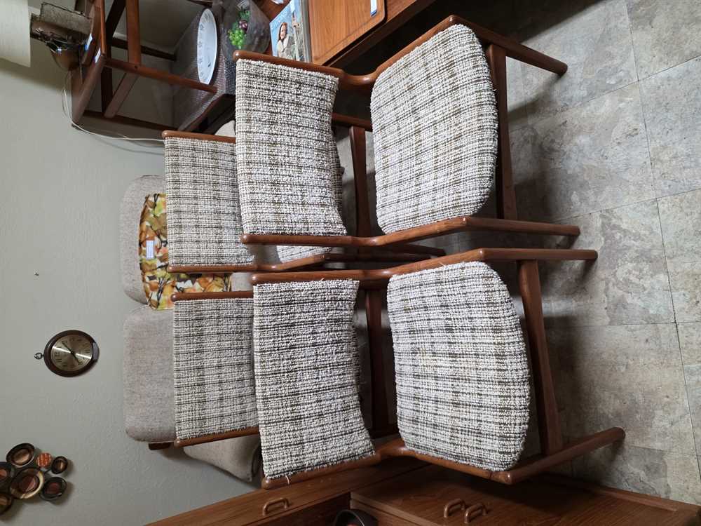 Set of 4 Uldum Mobler Teak Dining Chairs designed by Johannes Andersen